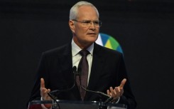 ExxonMobil CEO Darren Woods accused climate activists of abusing the shareholder proposal system