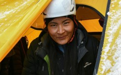 Nepal's Phunjo Lama smashed the record for the fastest ascent of Everest by a woman, conquering the world's highest mountain in 14 hours and 31 minutes