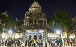 Voters queued long into the night after stations were overwhelmed by the high turnout 