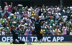 The USA's Saurabh Nethralvakar (left) celebrates after securing a shock win over Pakistan at the T20 Cricket World Cup