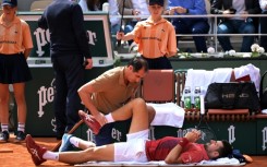 Novak Djokovic received treatment during his victory against Francisco Cerundolo at the French Open after which he withdrew with a knee injury