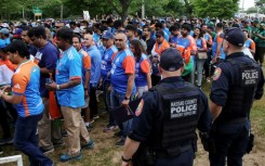 Supporters arrive for the Twenty20 World Cup cricket match between India and Pakistan at Nassau County International Cricket Stadium in East Meadow, New York on Sunday. 