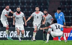 Afghanistan celebrate scoring against India earlier this year