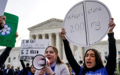 Abortion rights activists rally outside the US Supreme Court