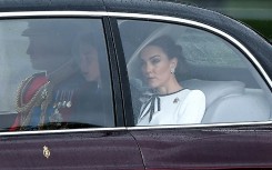 Kate (R) arrived at Buckingham Palace with her husband and children