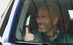 Zinedine Zidane all smiles before joining an illustrious list of ceremonial Le Mans starters including Steve McQueen and Brad Pitt 