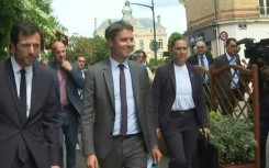 French PM campaigning for the general election near Paris