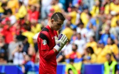 Andriy Lunin endured a tough afternoon in goal for Ukraine