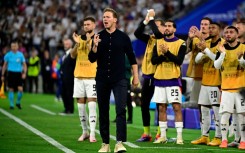 Julian Nagelsmann (C) overseeing Germany's opening victory against Scotland at Euro 2024