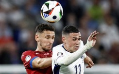 England's Phil Foden (R) struggled to make an impact against Serbia