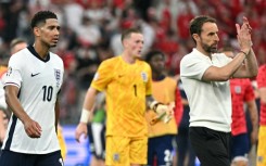 England boss Gareth Southgate (right) has said the Three Lions must improve at Euro 2024