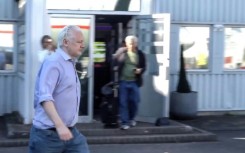 This screenshot courtesy of WikiLeaks's X page shows Julian Assange walking to board a plane from London Stansted Airport on June 24, 2024