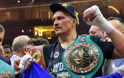 Oleksandr Usyk celebrates his victory over Britain's Tyson Fury in Riyadh