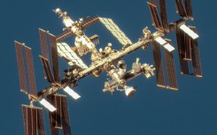 This handout image courtesy of Maxar Technologies taken on June 7, 2024 shows the Boeing Starliner spacecraft docked with the International Space Station's (ISS) forward port on the station's Harmony module