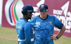 Sri Lanka’s Angelo Mathews (L) talks to Chris Silverwood during a practice session on March 29, 2024. Silverwood announced his resignation as head coach on Thursday