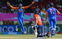 In the wickets: India's Axar Patel celebrates his dismissal of Moeen Ali