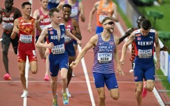 Britain's Josh Kerr celebrates winning the men's 1500m final at the World Athletics Championships