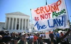 Anti-Trump demonstrators outside the Supreme Court as the justices delivered their ruling in the former president's immunity case