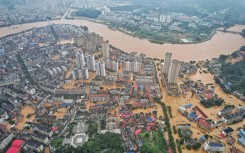 An aerial view of flooded buildings and streets in central China's Hunan province following heavy rains this week