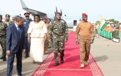 Niger's General Abdourahamane Tiani (C), pictured with his Burkinabe counterpart Captain Ibrahim Traore (R), is calling for the establishment of a 'community far removed from the stranglehold of foreign powers'