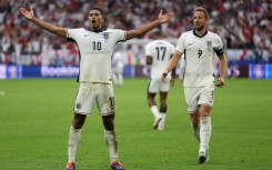 Jude Bellingham celebrates his equaliser against Slovakia which kept England in 2024