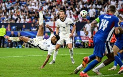 England's Jude Bellingham (left)is free to play against Switzerland after only receiving a suspended ban and fine for his gesture against Slovakia