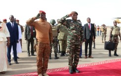 Niger's General Abdourahamane Tiani (R) with Burkinabe counterpart Captain Ibrahim Traore in Niamey