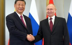 Xi Jinping, left, and Vladimir Putin want to challenge Washington's dominance in global affairs