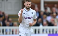 On his way: England's Gus Atkinson celebrates after dismissing West Indies captain Kraigg Brathwaite, his maiden wicket in a debut haul of 7-45 in the first Test at Lord's