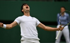 Spain's Carlos Alcaraz celebrates reaching the Wimbledon final