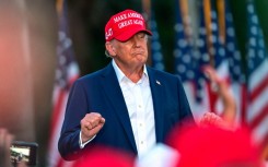 Republican presidential candidate Donald Trump gestures during a rally in Doral, Florida