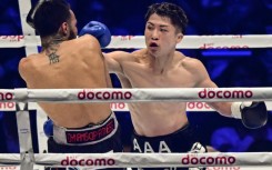 Undisputed super-bantamweight world champion Naoya Inoue (right) will defend his titles against Ireland's TJ Doheny in Tokyo in September