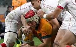 Australia's Fraser McReight scoring under pressure from Georgia at Allianz Stadium in Sydney