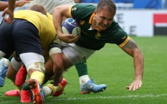 Andre Esterhuizen (R) playing for South Africa against Romania in the 2023 Rugby World Cup in France.