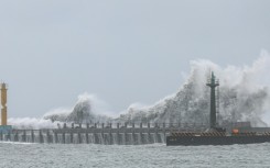 Massive waves crashed against the coast of northeastern Yilan county