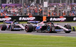 Esteban Ocon (R) and fellow Alpine driver Pierre Gasly (L) share the track in practice ahead of the Australian Grand Prix in March