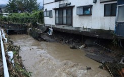 A house with collapsed foundations in Nikaho City, Akita prefecture