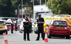 Police officers in Southport, northwest England, following the knife attack