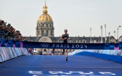 France's Cassandre Beaugrand pulled away from the field to win the women's triathlon on home soil