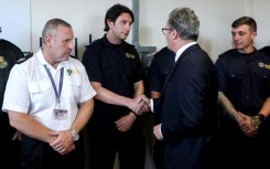 Britain's Prime Minister Keir Starmer met with emergency responders who went to the scene of a knife attack 