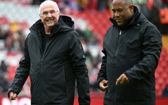 Sven-Goran Eriksson (L) and former England forward John Barnes took the pitch ahead of the Legends match between Liverpool and Ajax at Anfield in March