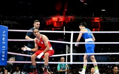 Algeria's Imane Khelif (in red) was given a huge roar on arrival at the Paris arena