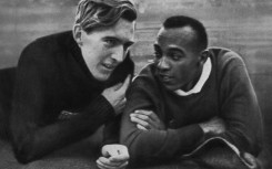 Jesse Owens and Luz Long chat at the Berlin Olympic Stadium during the 1936 Games