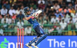 Sri Lanka's Dunith Wellalage plays a shot during the first one-day international (ODI) cricket match between Sri Lanka and India in Colombo on August 2