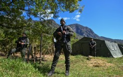 Colombian special forces stand guard at Farallones de Cali National Natural Park on the outskirts of Cali on July 6, 2024, during security operations ahead of the upcoming COP16 Summit