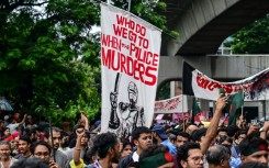 Activists marching in Dhaka to call for justice for those killed in the recent countrywide violence