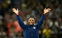 Simone Biles can win two more gold on the balance beam and floor exercise on Monday for five titles at the Paris Olympics