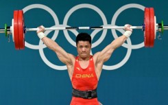 Show of strength - China's Li Fabin powers to weightlifting gold