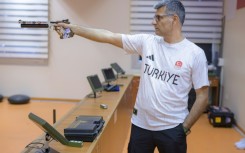 Cool shooting: Olympic silver medalist shooter Yusuf Dikec 