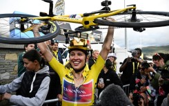 Katarzyna Niewiadoma celebrates after winning her maiden women's Tour de France crown